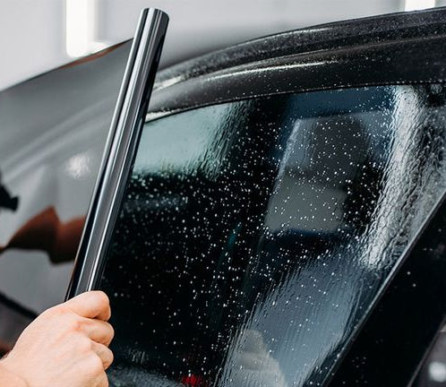 Installing window tint film on a car window