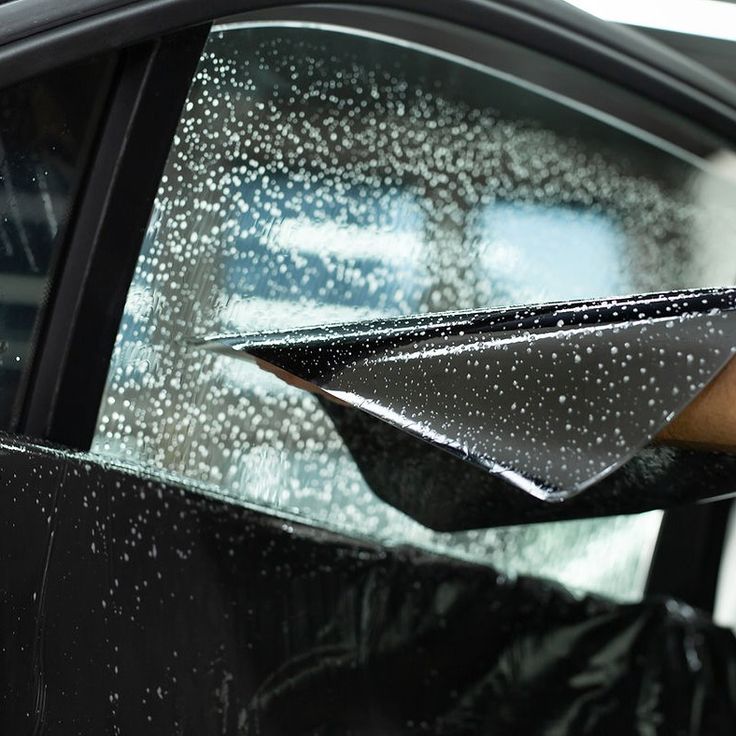 Window tint film installed on a car window