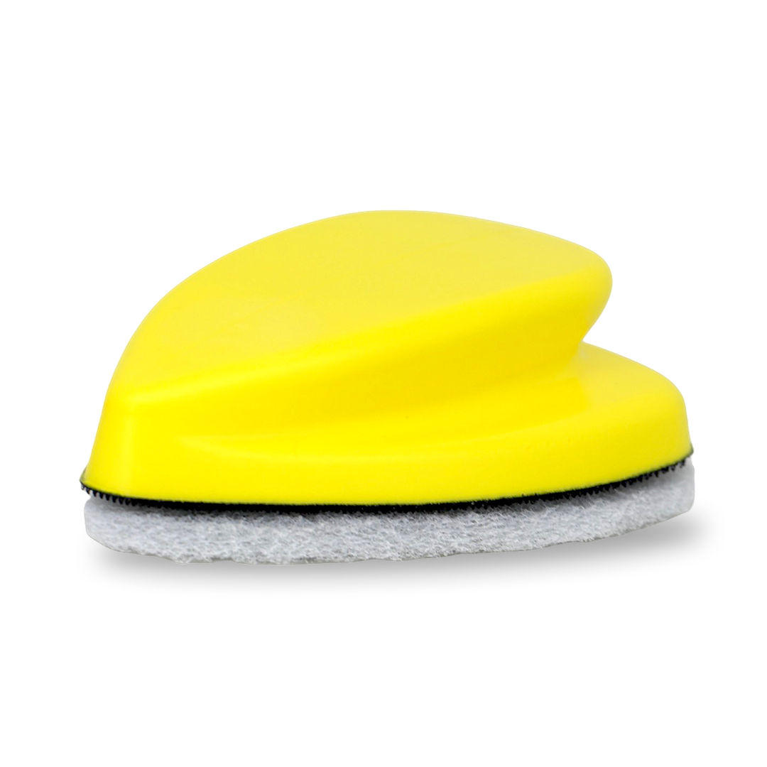 Tint scrubbing pad for cleaning glass surfaces before window film installation.