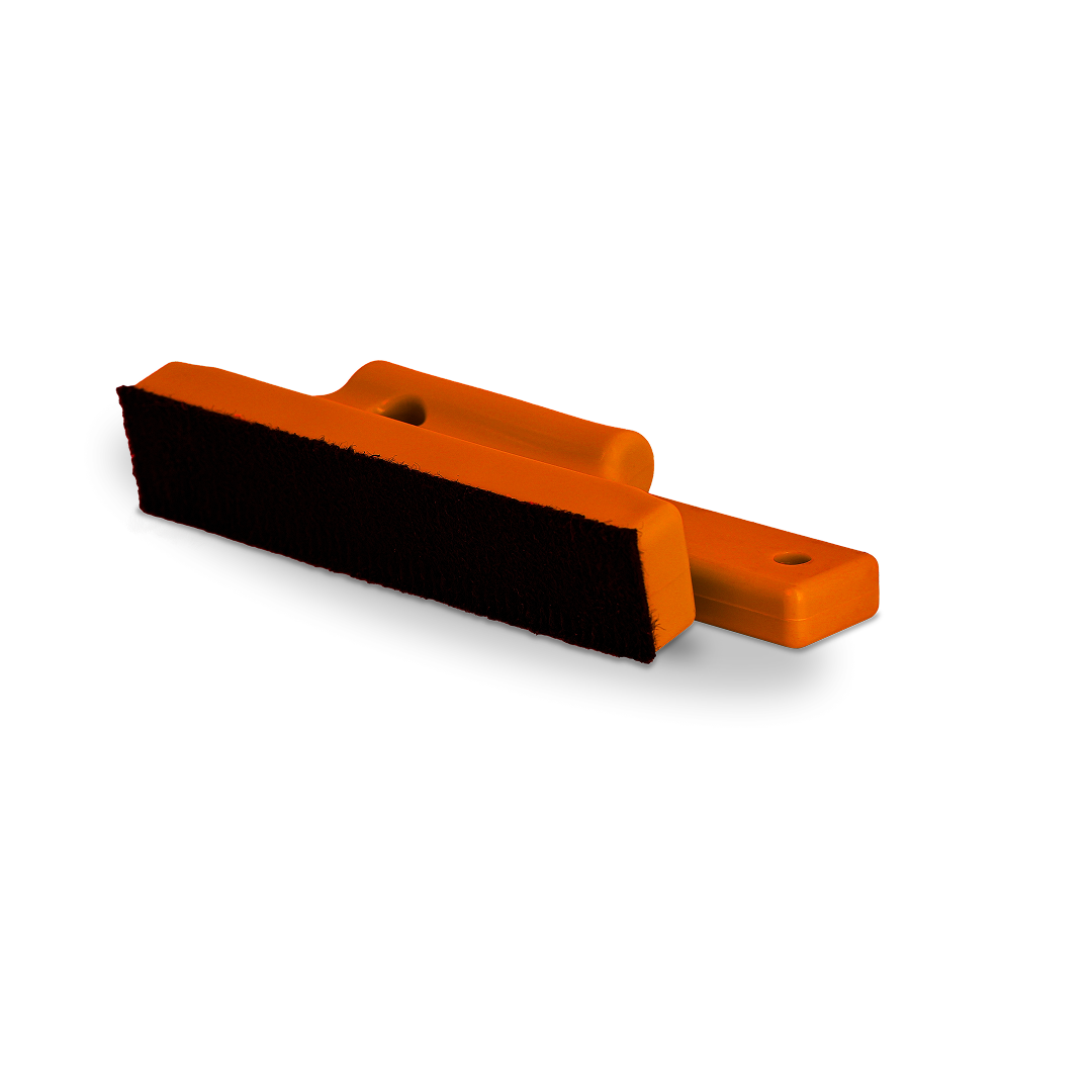 Stud-shaped magnet tool for vinyl and tint positioning.