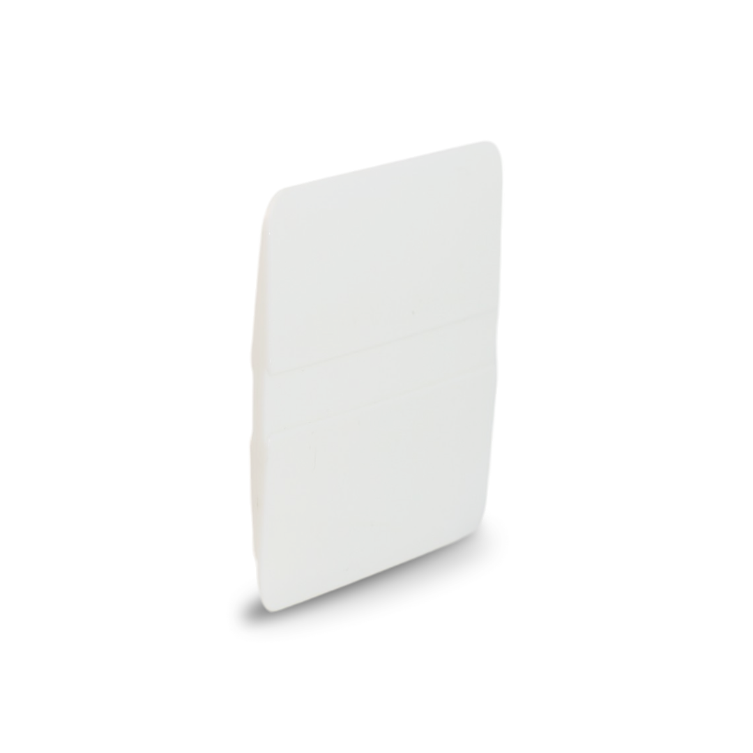 Thin white squeegee with hard flex design for tight spaces.