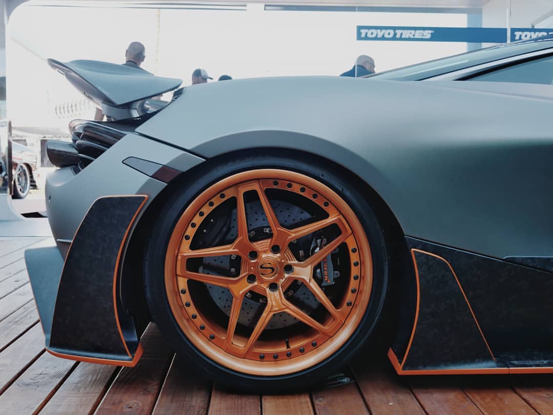 Luxury sports car fully wrapped in matte gray vinyl